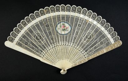 null The Flower Basket, China, circa 1800
Broken type ivory fan* finely cut with...