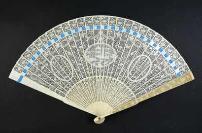 null The Pagoda, China, circa 1820
Broken type fan in ivory* very finely cut with...