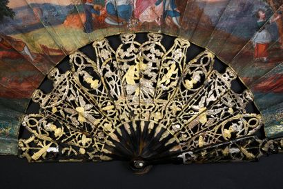 null The musette player, circa 1760-1770
Folded fan, the skin sheet painted with...