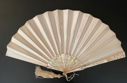 null The Pretty Shepherdess, circa 1890
Folded fan, the beige satin leaf painted...