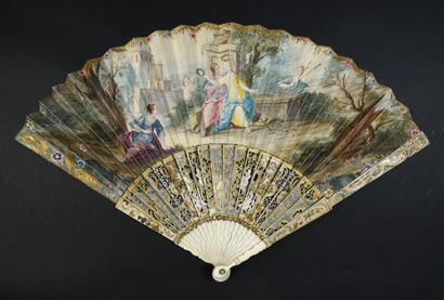null The happy couple, circa 1750
Folded fan, the leaf in skin, mounted in English,...