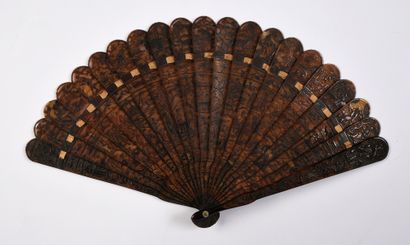 null Animals, China, 19th century Brown tortoiseshell fan** finely cut and engraved,...