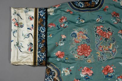 null Women's dress, China, late 19th century, celadon silk twill embroidered with...