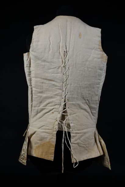 null Embroidered waistcoat, mid 18th century, cream silk satin brightly embroidered...
