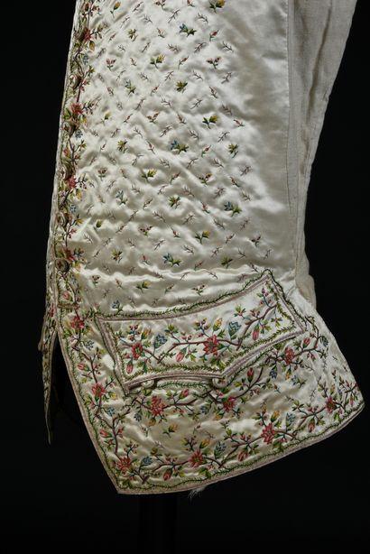  Embroidered waistcoat, mid 18th century, cream silk satin brightly embroidered with...