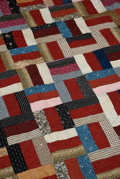 null Quilt, 20th century, geometric block design in strips of cotton canvas with...