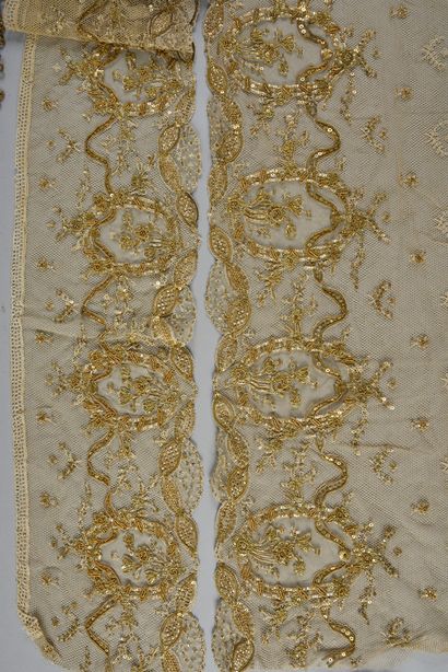 Two embroidered flounces for evening dress,...