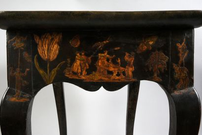 null Cabaret table in black varnish and arte povera, underside painted in red in...