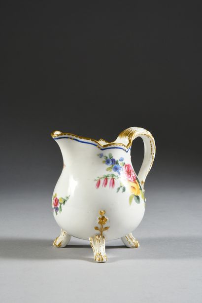  An 18th century Sèvres porcelain three-legged milk jug (1st size) Marks in brown...