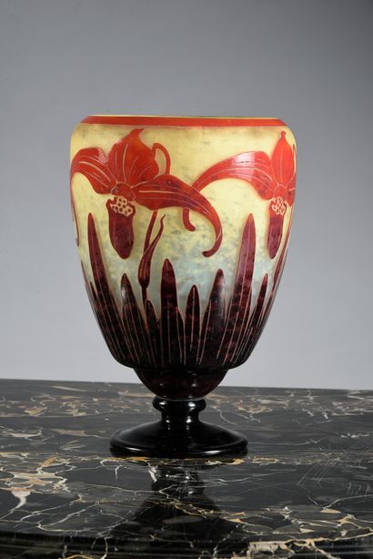 LE VERRE FRANÇAIS 
Orchid vase.
An ovoid vase with a wide neck, resting on a pedestal,...