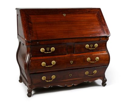 null A solid mahogany Scribanne chest of drawers with five drawers on three rows...