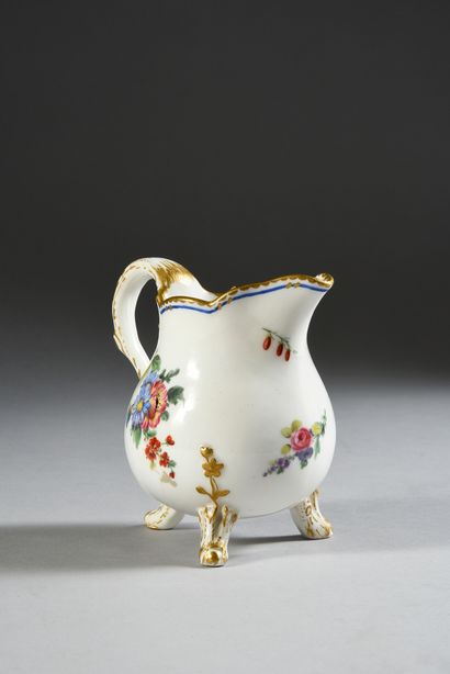  An 18th century Sèvres porcelain three-legged milk jug (1st size) Marks in brown...