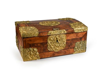 null Walnut veneer chest, rich ornamentation of brass embossed, openwork and gilded.
H...