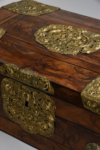 null Walnut veneer chest, rich ornamentation of brass embossed, openwork and gilded.
H...