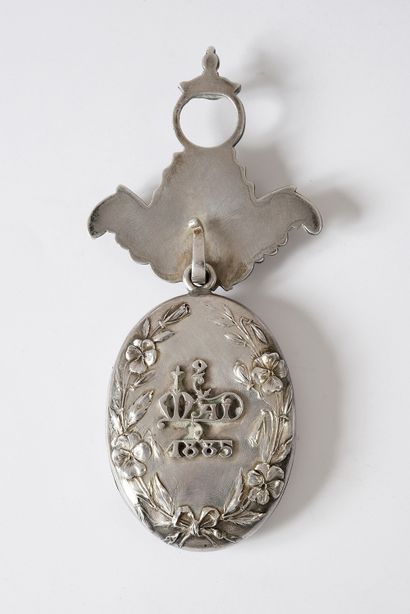 null Silver souvenir medallion engraved with an inscription "Roger 19 Sept. 1884"...