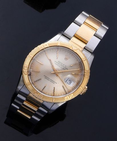 ROLEX Turn o grafh
Ref : 16263
Modèle en or et acier, cadran fond champagne (trace...