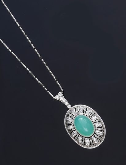 null White gold pendant 585e, set with an oval cabochon of chrysoprase in an openwork...