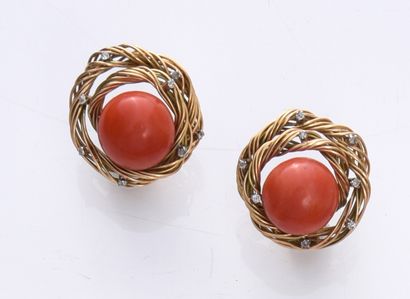 null Pair of earrings set with a 15.2 mm red coral button pearl in a gold wire scroll...