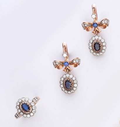 null Set consisting of a pair of earrings in 585th gold, with an oval sapphire in...
