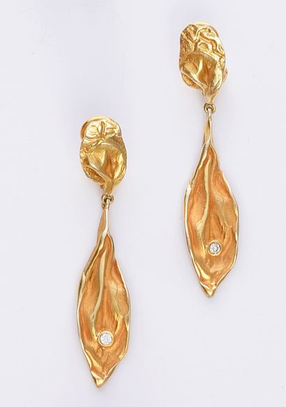 Pair of ear clips in 585th yellow gold with...