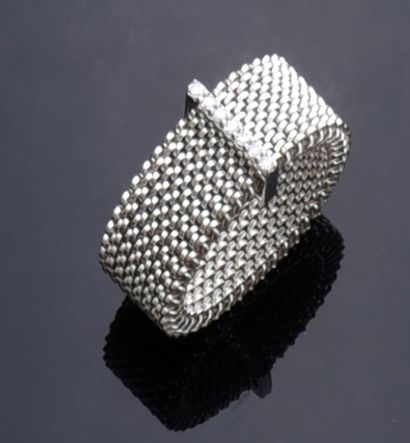 MAUBOUSSIN Moi non plus ring in steel mesh and 585th white gold set with diamonds.
Goldsmith's...