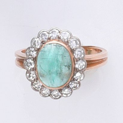 Gold ring 583e set with an oval emerald cabochon...