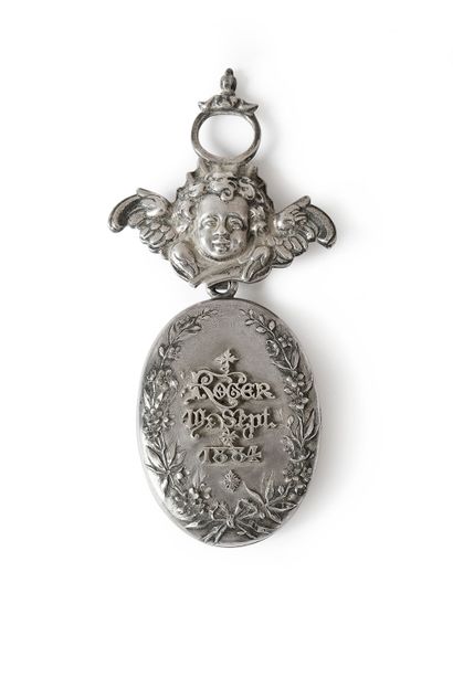 null Silver souvenir medallion engraved with an inscription "Roger 19 Sept. 1884"...