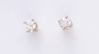 Pair of ear studs in pink gold 750e set with...