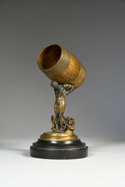 null The Barrel Bearer
Engraved bronze, chased and partly gilded, representing a...