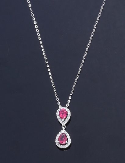 null Chain and pendant in 750th white gold, set with two pear-cut rubies, each weighing...