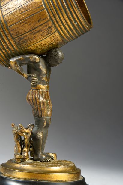 null The Barrel Bearer
Engraved bronze, chased and partly gilded, representing a...