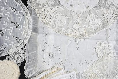  Table runner and doilies, end of the XIXth and beginning of the XXth century. The...