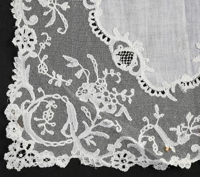 null Five small handkerchiefs framed with lace, late nineteenth century.
Three in...