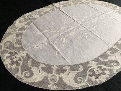null Centerpieces, embroidery and bobbin lace, early twentieth century.
A large oval...