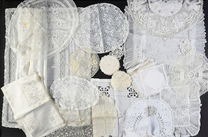 null Table runner and doilies, end of the XIXth and beginning of the XXth century.
The...