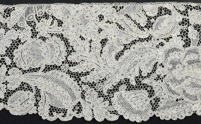 null Pair of needle lace engageantes, circa 1730-40.
Engageantes, probably cut from...