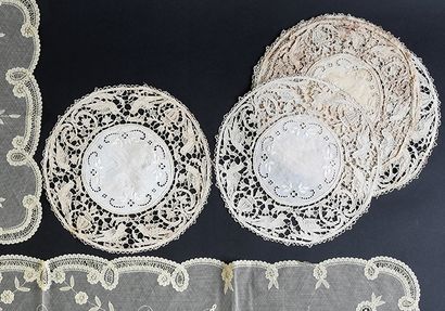 Embroidered and needle lace doilies, 1st...