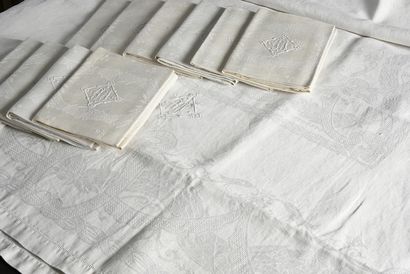 null Damask table service, tablecloth and twelve napkins, mid-twentieth century.
Damask...