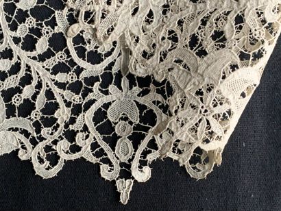 null Needlepoint lace border, late 19th century.
Punto in Aria type, decorated in...
