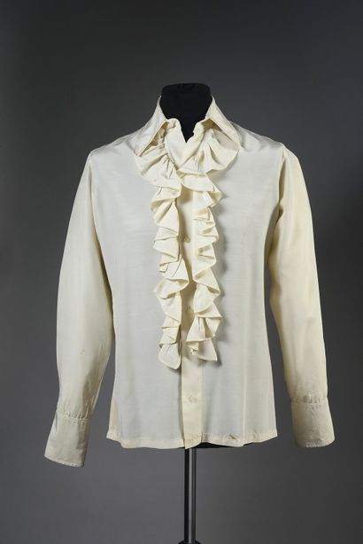 null JOHNNY HALLYDAY (1943/2017): 1 English brand white ruffled stage shirt worn...