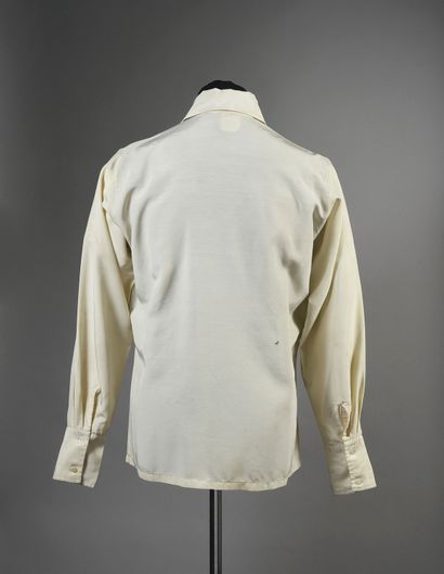 null JOHNNY HALLYDAY (1943/2017): 1 English brand white ruffled stage shirt worn...