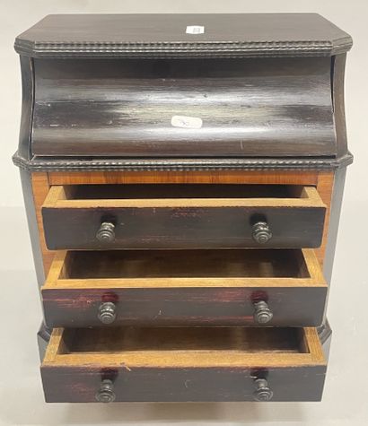 null Chest of drawers with three drawers in front and opening lid with accessories...