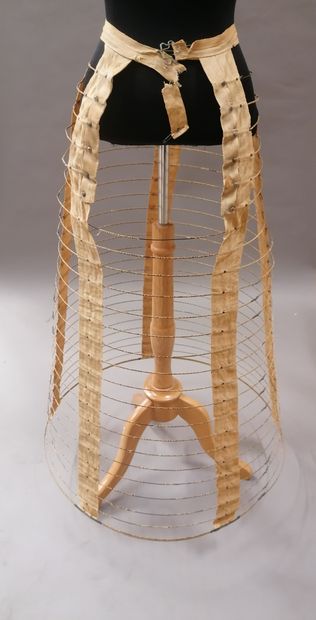null 470. cage crinoline, circa 1870, crinoline with 25 metal hoops attached to the...