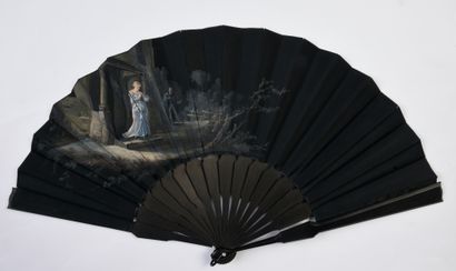 null Night, circa 1880
Folded fan, the black satin leaf painted in grisaille of a...
