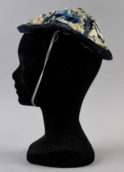 null 475. Small Chinese-style lady's hat, late 19th century, blue velvet cap on brassed...