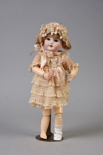 null Contemporary doll with open mouth bisque head marked Unisfrance 301 1/1/4.
AO2000....