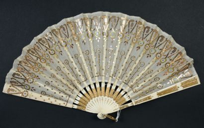 null Sequins, circa 1900-1920
Two fans.
*One, the beige leaf embroidered with stylized...