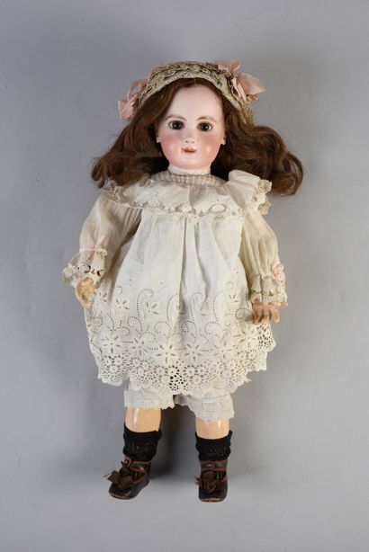 null BABY JUMEAU 9
French doll, with cast bisque head, closed mouth, marked DEPOSE...