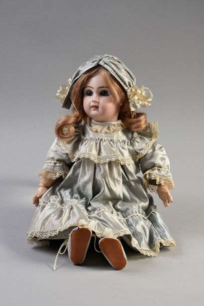 null BABY JUMEAU 7
French doll, with cast bisque head, closed mouth, marked DEPOSE...
