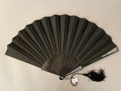 null Clothes, circa 1890
Folded fan, the black satin sheet painted with two young...